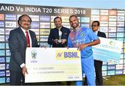 27 June 2018; Shikhar Dhawan of India is presented with the Fastest Fifty award by Sanjay Kumar, General Manager, BSNL, following the T20 International match between Ireland and India at Malahide Cricket Club Ground in Dublin. Photo by Seb Daly/Sportsfile