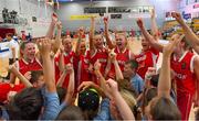 27 June 2018; Norway players celebrate with children from Scartleigh National School, Saleen, Midleton, Co. Cork, after the FIBA 2018 Women's European Championships for Small Nations Group B match between Cyprus and Norway at the Mardyke Arena in Cork, Ireland. Photo by Brendan Moran/Sportsfile