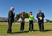 29 June 2018; Captains Laura Delany of Ireland and Salma Khatun of Bangladesh, with match referee Kevin Gallagher, right, and RTE commentator John Kenny, left, during the coin toss prior the Women's T20 International match between Ireland and Bangladesh at Malahide Cricket Club Ground in Dublin. Photo by Seb Daly/Sportsfile