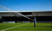 29 June 2018; A member of the Oriel Park groundstaff waters the pitch prior to the SSE Airtricity League Premier Division match between Dundalk and Cork City at Oriel Park in Dundalk, Louth. Photo by Stephen McCarthy/Sportsfile