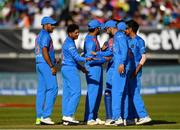 29 June 2018; Kuldeep Yadav of India, second left, is congratulated by team-mates after claiming the wicket of George Dockrell of Ireland during the T20 International match between Ireland and India at Malahide Cricket Club Ground in Dublin. Photo by Seb Daly/Sportsfile