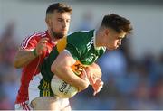 29 June 2018; Donal O’Sullivan of Kerry in action against Nathan Walsh of Cork during the EirGrid Munster GAA Football U20 Championship Final match between Kerry and Cork at Austin Stack Park in Tralee, Kerry. Photo by Piaras Ó Mídheach/Sportsfile