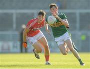 29 June 2018; Mark Ryan of Kerry gets past Colm O’Callaghan of Cork during the EirGrid Munster GAA Football U20 Championship Final match between Kerry and Cork at Austin Stack Park in Tralee, Kerry. Photo by Piaras Ó Mídheach/Sportsfile