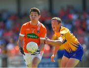 30 June 2018; Patrick Burns of Armagh in action against Cathal O’Connor of Clare during the GAA Football All-Ireland Senior Championship Round 3 match between Armagh and Clare at the Athletic Grounds in Armagh. Photo by Seb Daly/Sportsfile