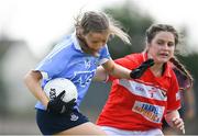 30 June 2018; Caoimhe O'Connor of Dublin in action against Clare O'Shea of Cork during the GAA All-Ireland Minor A Ladies Football Semi-final match between Cork and Dublin at MacDonagh Park in Nenagh, Tipperary. Photo by Harry Murphy/Sportsfile