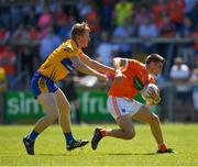 30 June 2018; Gregory McCabe of Armagh in action against Pearse Lillis of Clare during the GAA Football All-Ireland Senior Championship Round 3 match between Armagh and Clare at the Athletic Grounds in Armagh. Photo by Seb Daly/Sportsfile
