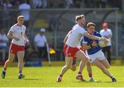 30 June 2018; Ciaran Brady of Cavan in action against Frank Burns of Tyrone during the GAA Football All-Ireland Senior Championship Round 3 match between Cavan and Tyrone at Brewster Park in Enniskillen, Fermanagh. Photo by Eóin Noonan/Sportsfile
