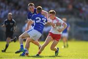 30 June 2018; Peter Harte of Tyrone is tackled by Jason McLoughlin of Cavan during the GAA Football All-Ireland Senior Championship Round 3 match between Cavan and Tyrone at Brewster Park in Enniskillen, Fermanagh. Photo by Eóin Noonan/Sportsfile