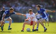 30 June 2018; Peter Harte of Tyrone in action against Jason McLoughlin, left, and Conor Bradley of Cavan during the GAA Football All-Ireland Senior Championship Round 3 match between Cavan and Tyrone at Brewster Park in Enniskillen, Fermanagh. Photo by Eóin Noonan/Sportsfile