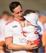 30 June 2018; Colm Cavanagh of Tyrone with his daughter Chloe, age 11 months, following the GAA Football All-Ireland Senior Championship Round 3 match between Cavan and Tyrone at Brewster Park in Enniskillen, Fermanagh. Photo by Eóin Noonan/Sportsfile