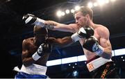 30 June 2018; Gary Corcoran, right, in action against Victor Ray Ankrah during their welterweight bout at the SSE Arena in Belfast. Photo by Ramsey Cardy/Sportsfile