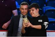 30 June 2018; Boxer Carl Frampton has his photograph taken with a fan at the SSE Arena in Belfast. Photo by Ramsey Cardy/Sportsfile