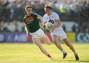 30 June 2018; Paul Cribbin of Kildare in action against Paddy Durcan of Mayo during the GAA Football All-Ireland Senior Championship Round 3 match between Kildare and Mayo at St Conleth's Park in Newbridge, Kildare. Photo by Piaras Ó Mídheach/Sportsfile