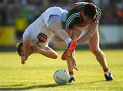 30 June 2018; Paul Cribbin of Kildare is tackled by Diarmuid O’Connor of Mayo during the GAA Football All-Ireland Senior Championship Round 3 match between Kildare and Mayo at St Conleth's Park in Newbridge, Kildare. Photo by Piaras Ó Mídheach/Sportsfile