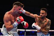 30 June 2018; Johnny Coyle in action against Lewis Benson during their super-lightweight bout at the SSE Arena in Belfast. Photo by Ramsey Cardy/Sportsfile