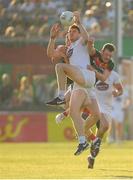 30 June 2018; Kevin Feely of Kildare wins a kick-out ahead of Diarmuid O’Connor and Colm Boyle, right, of Kildare during the GAA Football All-Ireland Senior Championship Round 3 match between Kildare and Mayo at St Conleth's Park in Newbridge, Kildare. Photo by Piaras Ó Mídheach/Sportsfile