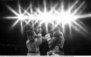 30 June 2018; (EDITOR'S NOTE; Image has been converted to Black & White) Johnny Coyle, left, in action against Lewis Benson during their super-lightweight bout at the SSE Arena in Belfast. Photo by Ramsey Cardy/Sportsfile