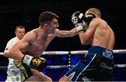 30 June 2018; Tyrone Mccullagh, left, in action against Joe Ham during their Celtic super-bantamweight Championship bout at the SSE Arena in Belfast. Photo by Ramsey Cardy/Sportsfile
