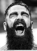 30 June 2018; (EDITOR'S NOTE; Image has been converted to Black & White) Jono Carroll celebrates defeating Declan Geraghty in their IBF Intercontinental super-featherweight bout at the SSE Arena in Belfast. Photo by Ramsey Cardy/Sportsfile