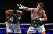 30 June 2018; Michael Conlan, right, in action against Adeilson Dos Santos during their Super Featherweight bout at the SSE Arena in Belfast. Photo by Ramsey Cardy/Sportsfile