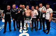 30 June 2018; Michael Conlan with team, including father John and brother Jamie, trainer Adam Booth and boxer Ryan Burnett after defeating Adeilson Dos Santos during their Super Featherweight bout at the SSE Arena in Belfast.  Photo by Ramsey Cardy/Sportsfile