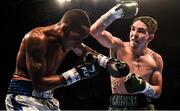 30 June 2018; Michael Conlan, left, in action against Adeilson Dos Santos during their Super Featherweight bout at the SSE Arena in Belfast.  Photo by Ramsey Cardy/Sportsfile