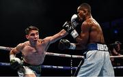 30 June 2018; Michael Conlan, right, in action against Adeilson Dos Santos during their Super Featherweight bout at the SSE Arena in Belfast.  Photo by Ramsey Cardy/Sportsfile