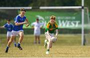 1 July 2018; David Tarmey of Claregalway in action against Cathal O'Callaghan of Laune Rangers during the John West Féile Peil na nÓg National Competitions 2018 match between Claregalway and Laune Rangers, Co. Kerry, at Stamullen GAA in Meath. This is the third year that the Féile na nGael and Féile Peile na nÓg have been sponsored by John West, one of the world’s leading suppliers of fish. The competition gives up-and-coming GAA superstars the chance to participate and play in their respective Féile tournament, at a level which suits their age, skills and strengths. Photo by Harry Murphy/Sportsfile