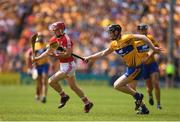 1 July 2018; Daniel Kearney of Cork in action against Jamie Shanahan of Clare  during the Munster GAA Hurling Senior Championship Final match between Cork and Clare at Semple Stadium in Thurles, Tipperary. Photo by Eóin Noonan/Sportsfile