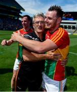 1 July 2018; John Michael Nolan of Carlow celebrates with team manager Colm Bonnar after the Joe McDonagh Cup Final match between Westmeath and Carlow at Croke Park in Dublin. Photo by Daire Brennan/Sportsfile
