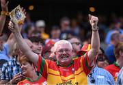 1 July 2018; A Carlow supporter celebrates following the Joe McDonagh Cup Final match between Westmeath and Carlow at Croke Park in Dublin. Photo by Stephen McCarthy/Sportsfile