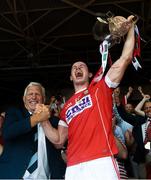 1 July 2018; Seamus Harnedy of Cork is presented with the trophy by Munster Chairman Jerry O'Sullivan after the Munster GAA Hurling Senior Championship Final match between Cork and Clare at Semple Stadium in Thurles, Tipperary. Photo by Ray McManus/Sportsfile
