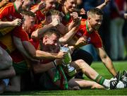 1 July 2018; Carlow players celebrate with the Joe McDonagh Cup after the Joe McDonagh Cup Final match between Westmeath and Carlow at Croke Park in Dublin. Photo by Daire Brennan/Sportsfile