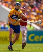 1 July 2018; Podge Collins of Clare is tackled by Daniel Kearney of Cork during the Munster GAA Hurling Senior Championship Final match between Cork and Clare at Semple Stadium in Thurles, Tipperary. Photo by Eóin Noonan/Sportsfile