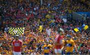 1 July 2018; Clare supporters celebrate a point during the Munster GAA Hurling Senior Championship Final match between Cork and Clare at Semple Stadium in Thurles, Tipperary. Photo by Eóin Noonan/Sportsfile