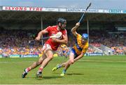 1 July 2018; Christopher Joyce of Cork in action against Shane O'Donnell of Clare during the Munster GAA Hurling Senior Championship Final match between Cork and Clare at Semple Stadium in Thurles, Tipperary. Photo by David Fitzgerald/Sportsfile