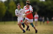 1 July 2018; Cahir Speirs of O'Donovan Rossa GAC in action against Ian Kavanagh of New York during the John West Féile Peil na nÓg National Competitions 2018 match between ODonovan Rossa GAC and New York at Stamullen GAA in Meath. This is the third year that the Féile na nGael and Féile Peile na nÓg have been sponsored by John West, one of the world’s leading suppliers of fish. The competition gives up-and-coming GAA superstars the chance to participate and play in their respective Féile tournament, at a level which suits their age, skills and strengths. Photo by Harry Murphy/Sportsfile