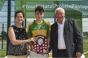 1 July 2018; Jack Ramsay of Claregalway is presented the Boys Division 1 Shield by Anne-Claire Monde Marketing Manager of John West, left, and Brendan Brien Chairman of NAtional Féile during the John West Féile Peil na nÓg National Competitions 2018 match between Claregalway and Clonduff GAC at Stamullen GAA in Meath. This is the third year that the Féile na nGael and Féile Peile na nÓg have been sponsored by John West, one of the world’s leading suppliers of fish. The competition gives up-and-coming GAA superstars the chance to participate and play in their respective Féile tournament, at a level which suits their age, skills and strengths. Photo by Harry Murphy/Sportsfile