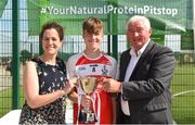 1 July 2018; Conall Higgins of O Donovan Rossa GAC is presented their Boys Division 1 Cup by Anne-Claire Monde Marketing Manager of John West and Brendan Brien Chairman of National Féile during the John West Féile Peil na nÓg National Competitions 2018 match between Burren GAC and O Donovan Rossa GAC at Stamullen GAA in Meath. This is the third year that the Féile na nGael and Féile Peile na nÓg have been sponsored by John West, one of the world’s leading suppliers of fish. The competition gives up-and-coming GAA superstars the chance to participate and play in their respective Féile tournament, at a level which suits their age, skills and strengths. Photo by Harry Murphy/Sportsfile