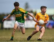 1 July 2018; Eoghan McAlinden of Clonduff GAC in action against Jack Buckley of Claregalway during the John West Féile Peil na nÓg National Competitions 2018 match between Claregalway and Clonduff GAC at Stamullen GAA in Meath. This is the third year that the Féile na nGael and Féile Peile na nÓg have been sponsored by John West, one of the world’s leading suppliers of fish. The competition gives up-and-coming GAA superstars the chance to participate and play in their respective Féile tournament, at a level which suits their age, skills and strengths. Photo by Harry Murphy/Sportsfile