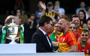 1 July 2018; Ard Stiúrthóir of the GAA Tom Ryan shakes hands with Carlow joint captain Richard Cody following the Joe McDonagh Cup Final match between Westmeath and Carlow at Croke Park in Dublin. Photo by Ramsey Cardy/Sportsfile