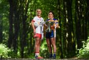 3 July 2018; Breaking new ground: Top inter-county stars took in the breath-taking scenery at Mullaghmeen Forest in county Westmeath, to launch the revamped 2018 TG4 All-Ireland championships. TG4 have announced a four-year extension of their sponsorship of the Ladies Football championships, with the new deal set to last until the conclusion of the 2022 season. 17 Ladies Football championship games will be broadcast this summer exclusively live on TG4, with the senior and intermediate championships to be played on a new, round-robin basis. Pictured are Neamh Woods of Tyrone, left, and Laurie Ryan of Clare, at Mullaghmeen Forest, Co. Westmeath.  Photo by Seb Daly/Sportsfile
