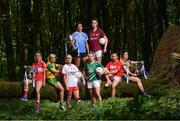 3 July 2018; Breaking new ground: Top inter-county stars took in the breath-taking scenery at Mullaghmeen Forest in county Westmeath, to launch the revamped 2018 TG4 All-Ireland championships. TG4 have announced a four-year extension of their sponsorship of the Ladies Football championships, with the new deal set to last until the conclusion of the 2022 season. 17 Ladies Football championship games will be broadcast this summer exclusively live on TG4, with the senior and intermediate championships to be played on a new, round-robin basis. Pictured are, from left, Rebecca Carr of Louth, Karen Guthrie of Donegal, Neamh Woods of Tyrone, Niamh McEvoy of Dublin, Cathy Mee of Limerick, Áine McDonagh of Galway, Melissa Duggan of Cork, and Laurie Ryan, of Clare at Mullaghmeen Forest, Co. Westmeath. Photo by Seb Daly / Sportsfile