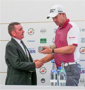 3 July 2018; Padraig Harrington of Ireland receives an honorary lifetime membership of Ballyliffin Golf Club from the Captain Paddy McDermott during a press conference after a practice round ahead of the Dubai Duty Free Irish Open Golf Championship at Ballyliffin Golf Club in Ballyliffin, Co Donegal.  Photo by John Dickson/Sportsfile