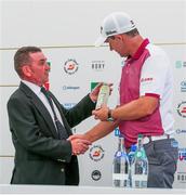 3 July 2018; Padraig Harrington of Ireland receives an honorary lifetime membership of Ballyliffin Golf Club from the Captain Paddy McDermott during a press conference after a practice round ahead of the Dubai Duty Free Irish Open Golf Championship at Ballyliffin Golf Club in Ballyliffin, Co Donegal.  Photo by John Dickson/Sportsfile