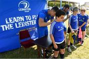 4 July 2018; Leinster player Noel Reid signs Rodrigo Cano Prieto's jeresy during the Bank of Ireland Leinster Rugby Summer Camp at Wexford Wanderers RFC in Wexford. Photo by Matt Browne/Sportsfile
