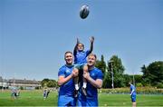 4 July 2018; Leinster players Rory O'Loughlin, left, and James Tracy with summer camp attendee, Emily Sexton, age 8, from Milltown, Co Dublin, during the Bank of Ireland Leinster Rugby Summer Camp at Energia Park in Donnybrook, Dublin. Photo by David Fitzgerald/Sportsfile