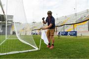 4 July 2018; Groundsman Stephen Forrest puts out the flags before the Bord Gáis Energy Munster GAA Hurling U21 Championship Final match between Cork and Tipperary at Pairc Ui Chaoimh in Cork. Photo by Matt Browne/Sportsfile