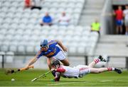 4 July 2018; Ger Collins of Cork in action against David Gleeson of Tipperary during the Bord Gáis Energy Munster GAA Hurling U21 Championship Final match between Cork and Tipperary at Pairc Ui Chaoimh in Cork. Photo by Eóin Noonan/Sportsfile