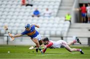 4 July 2018; Ger Collins of Cork in action against David Gleeson of Tipperary during the Bord Gáis Energy Munster GAA Hurling U21 Championship Final match between Cork and Tipperary at Pairc Ui Chaoimh in Cork. Photo by Eóin Noonan/Sportsfile